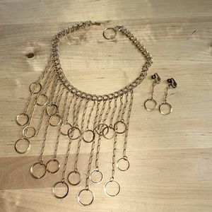 Vintage 1960s gold tone disco glam necklace and earring set.